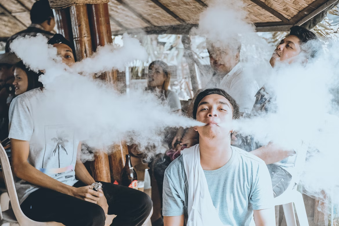 Vaping in a group, a group of boys vaping in a stylish way,Without nicotine vapes and smokes, Disposable vapes and smokes, chargeable vape pen, Foodgod, mega, myle, Juul, Flum, suorin, puff, air bar, hide all these vapes and smokes are available.